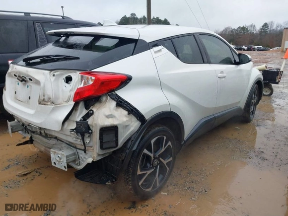 2019 Toyota C-HR XLE with VIN NMTKHMBX4KR080517, listed as a IAAI auction lot 41564786 with 102,508 mi miles. Bid and sale history available at carsss.com. Image 4.