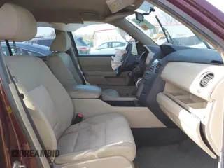 2014 Honda Pilot LX with VIN 5FNYF4H29EB031593, listed as a IAAI auction lot 41769098 with 153,401 mi miles and . Bid and sale history available at carsss.com. Image 5.