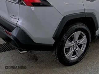 2023 Toyota RAV4 Hybrid XLE with VIN 2T3RWRFV9PW175446, listed as a IAAI auction lot 42806880 with 90,261 mi miles and . Bid and sale history available at DreamBid. Image 20.