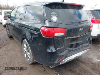 2016 Kia Sedona SX-L with VIN KNDME5C16G6148150, listed as a IAAI auction lot 41744207 with 102,696 mi miles. Bid and sale history available at carsss.com. Image 3.