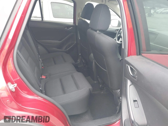 2016 Mazda CX-5 Touring with VIN JM3KE2CY3G0877185, listed as a IAAI auction lot 41729243 with 144,656 mi miles. Bid and sale history available at carsss.com. Image 8.