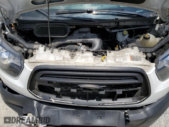 2019 Ford Transit z VIN 1FTYE1ZM4KKB38454, wystawiony jako Copart lot #59751635 z przebiegiem 187 153 mil mil oraz Szkoda całkowita • Salvage title. Historia ofert i sprzedaży dostępna na DreamBid. Obrazek 12.