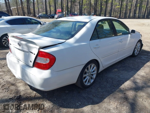 2003 Toyota Camry LE z VIN JTDBF30K930147772, wystawiony jako IAAI lot #41768713 z przebiegiem 231 537 mil mil oraz . Historia ofert i sprzedaży dostępna na DreamBid. Obrazek 4.