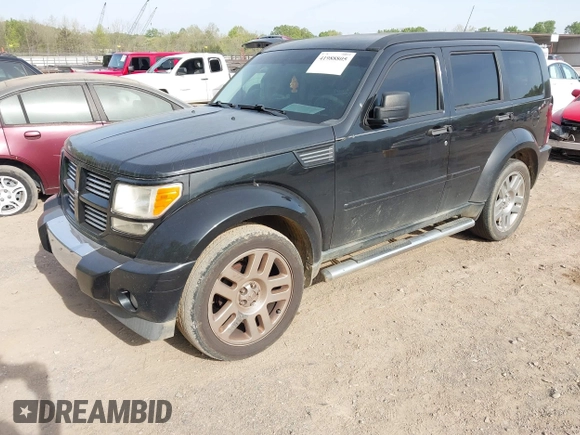 2011 Dodge Nitro Heat with VIN 1D4PT4GK9BW600829, listed as a IAAI auction lot 41988805 with 236,794 mi miles and . Bid and sale history available at DreamBid. Image 2.