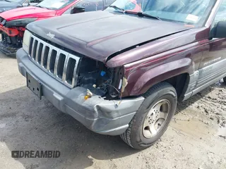 1997 Jeep Grand Cherokee Laredo with VIN 1J4GZ58S4VC702040, listed as a IAAI auction lot 42165536 with 121,803 mi miles and . Bid and sale history available at DreamBid. Image 6.