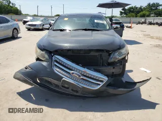 2011 Ford Taurus Limited with VIN 1FAHP2FW4BG107266, listed as a Copart auction lot 56921495 with Not provided miles and Salvage title. Bid and sale history available at DreamBid. Image 5.