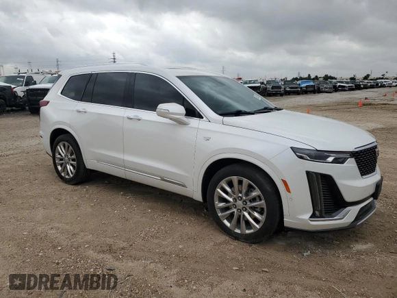 2021 Cadillac XT6 Premium Luxury with VIN 1GYKPCRSXMZ169206, listed as a Copart auction lot 55953525 with 64,789 mi miles and Salvage Title. Bid and sale history available at DreamBid. Image 4.