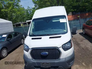 2022 Ford Transit Cargo z VIN 1FTBR3XG4NKA04700, wystawiony jako IAAI lot #42753263 z przebiegiem 80 467 mil mil oraz . Historia ofert i sprzedaży dostępna na DreamBid. Obrazek 12.