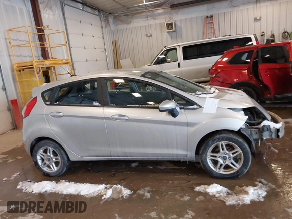 2019 Ford Fiesta SE with VIN 3FADP4EJ8KM142043, listed as a IAAI auction lot 41592365 with 55,005 mi miles and . Bid and sale history available at carsss.com. Image 13.