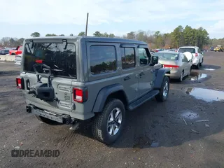 2021 Jeep Wrangler Unlimited Willys Sport with VIN 1C4HJXDGXMW767633, listed as a IAAI auction lot 41700168 with 37,994 mi miles and . Bid and sale history available at DreamBid. Image 4.