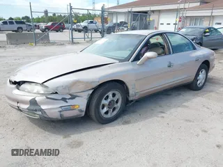 1999 Oldsmobile Aurora z VIN 1G3GR62C5X4114285, wystawiony jako IAAI lot #42271517 z przebiegiem 308 731 mil mil oraz . Historia ofert i sprzedaży dostępna na DreamBid. Obrazek 2.