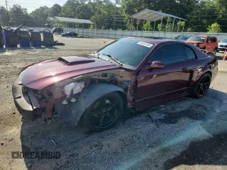 2004 Ford Mustang GT Deluxe with VIN 1FAFP42XX4F111834, listed as a Copart auction lot 64357185 with 92,453 mi miles and Salvage title. Bid and sale history available at DreamBid. Image 1.
