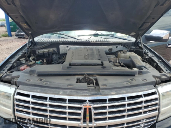 2012 Lincoln Navigator z VIN 5LMJJ3H57CEL01528, wystawiony jako Copart lot #66625424 z przebiegiem 150 658 mil mil oraz Szkoda całkowita • Salvage title. Historia ofert i sprzedaży dostępna na DreamBid. Obrazek 14.