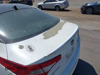 2013 Kia Optima SX with VIN 5XXGR4A64DG239506, listed as a IAAI auction lot 42406234 with 158,626 mi miles and . Bid and sale history available at DreamBid. Image 13.