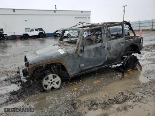 2010 Jeep Wrangler Unlimited Rubicon with VIN 1J4BA6H12AL116672, listed as a Copart auction lot 86574844 with 0 mi miles and Salvage Title. Bid and sale history available at carsss.com. Image 1.
