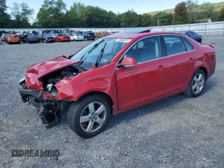 2009 Volkswagen Jetta SE z VIN 3VWRZ71K69M177746, wystawiony jako Copart lot #70990074 z przebiegiem 128 390 mil mil oraz Szkoda całkowita • Salvage title. Historia ofert i sprzedaży dostępna na DreamBid. Obrazek 1.