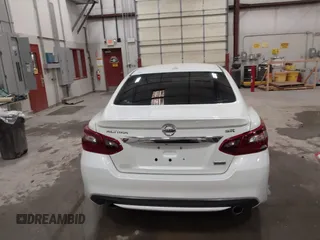 2018 Nissan Altima SV with VIN 1N4AL3AP9JC271718, listed as a IAAI auction lot 41787242 with 73,523 mi miles and . Bid and sale history available at carsss.com. Image 16.