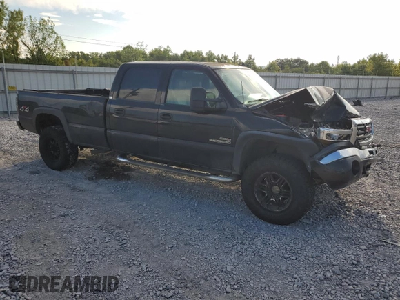 2006 GMC Sierra 3500 DRW SL z VIN 1GTHK33236F115273, wystawiony jako Copart lot #68807084 z przebiegiem 249 002 mil mil oraz Szkody całkowita. Historia ofert i sprzedaży dostępna na DreamBid. Obrazek 4.