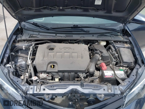 2018 Toyota Corolla L with VIN 5YFBURHE8JP770696, listed as a IAAI auction lot 42386025 with 63,224 mi miles and . Bid and sale history available at DreamBid. Image 10.