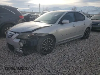 2006 Mazda 3 s with VIN JM1BK324261542255, listed as a Copart auction lot 84252034 with 196,030 mi miles and Salvage Title. Bid and sale history available at DreamBid. Image 1.