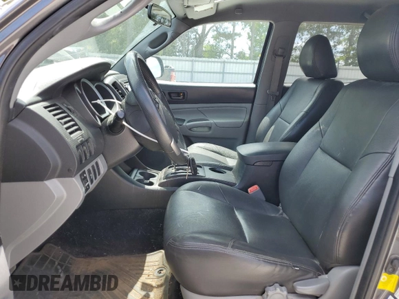 2014 Toyota Tacoma PreRunner with VIN 5TFJX4GN7EX028160, listed as a Copart auction lot 58193715 with 108,519 mi miles and Salvage title. Bid and sale history available at DreamBid. Image 7.