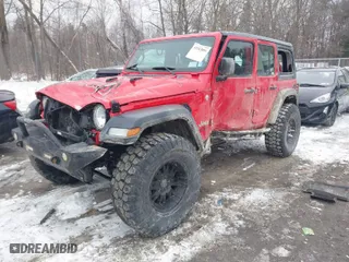 2018 Jeep Wrangler Unlimited Sport S with VIN 1C4HJXDG5JW131522, listed as a IAAI auction lot 41563099 with 75,405 mi miles. Bid and sale history available at carsss.com. Image 2.