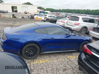 2015 Ford Mustang V6 with VIN 1FA6P8AM2F5321402, listed as a IAAI auction lot 42215558 with 137,209 mi miles and . Bid and sale history available at DreamBid. Image 13.