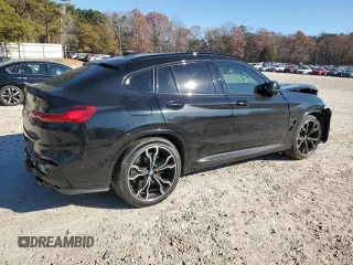 2020 BMW X4 M Competition z VIN 5YMUJ0C00L9C44560, wystawiony jako Copart lot #83274014 z przebiegiem Nie podano mil oraz Szkoda całkowita • Salvage title. Historia ofert i sprzedaży dostępna na DreamBid. Obrazek 3.