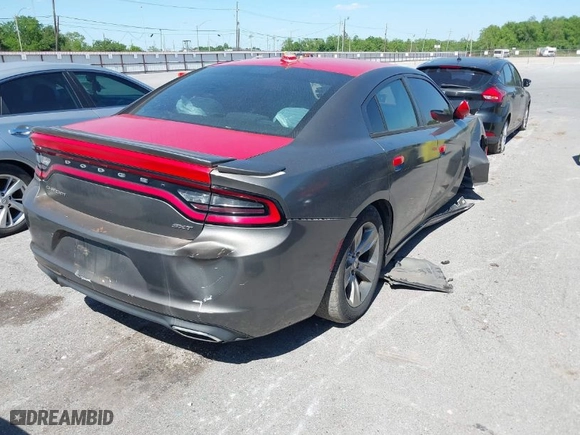 2016 Dodge Charger SXT with VIN 2C3CDXHG9GH214362, listed as a IAAI auction lot 42028636 with 225,392 mi miles. Bid and sale history available at carsss.com. Image 4.