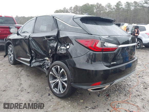 2021 Lexus RX with VIN 2T2HZMAA0MC201749, listed as a IAAI auction lot 41426758 with 148,064 mi miles. Bid and sale history available at carsss.com. Image 3.