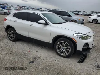 2019 BMW X2 sDrive28i with VIN WBXYJ3C58K5N39693, listed as a Copart auction lot 86760414 with 77,668 mi miles and Salvage Title. Bid and sale history available at carsss.com. Image 4.