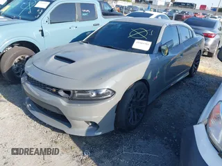2019 Dodge Charger Scat Pack with VIN 2C3CDXGJ6KH542229, listed as a IAAI auction lot 41989204 with 28,388 mi miles and . Bid and sale history available at DreamBid. Image 2.
