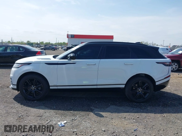 2020 Land Rover Range Rover Velar R-Dynamic S z VIN SALYK2EX4LA272072, wystawiony jako IAAI lot #41910957 z przebiegiem 63 823 mil mil oraz . Historia ofert i sprzedaży dostępna na DreamBid. Obrazek 14.