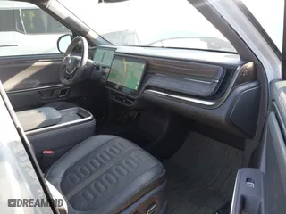 2022 Rivian R1T Adventure Package with VIN 7FCTGAAA5NN007018, listed as a IAAI auction lot 42018939 with 41,991 mi miles. Bid and sale history available at carsss.com. Image 5.