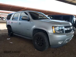 2011 Chevrolet Tahoe LS with VIN 1GNSCAE02BR181767, listed as a IAAI auction lot 42078569 with 212,857 mi miles and . Bid and sale history available at DreamBid. Image 1.