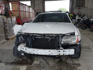 2013 Chrysler 300 with VIN 2C3CCAEG1DH576329, listed as a IAAI auction lot 41924329 with 191,602 mi miles. Bid and sale history available at carsss.com. Image 6.