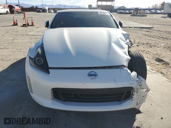 2014 Nissan 370Z Nismo with VIN JN1AZ4EH0EM635111, listed as a Copart auction lot 87292134 with 185,356 mi miles and Salvage Title. Bid and sale history available at DreamBid. Image 5.