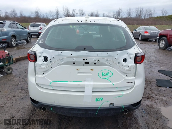 2019 Mazda CX-5 Sport with VIN JM3KFBBM2K0629966, listed as a IAAI auction lot 41953702 with 48,496 mi miles and . Bid and sale history available at DreamBid. Image 17.