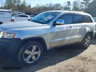 2013 Jeep Grand Cherokee Limited with VIN 1C4RJFBG5DC634023, listed as a IAAI auction lot 41828704 with 132,286 mi miles. Bid and sale history available at carsss.com. Image 6.