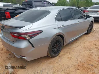 2023 Toyota Camry SE with VIN 4T1T11AK1PU736752, listed as a IAAI auction lot 41986290 with 38,636 mi miles and . Bid and sale history available at DreamBid. Image 4.