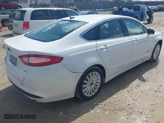 2015 Ford Fusion Energi SE Luxury with VIN 3FA6P0PU6FR128725, listed as a IAAI auction lot 41942887 with 138,731 mi miles. Bid and sale history available at carsss.com. Image 4.