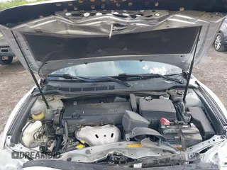 2008 Toyota Camry LE z VIN 4T1BE46K98U753908, wystawiony jako IAAI lot #42144867 z przebiegiem 158 520 mil mil oraz . Historia ofert i sprzedaży dostępna na DreamBid. Obrazek 10.