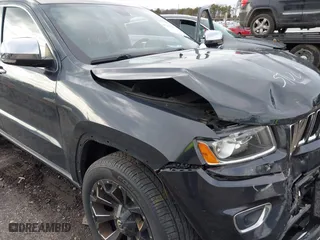 2014 Jeep Grand Cherokee Limited with VIN 1C4RJFBT7EC258715, listed as a IAAI auction lot 41735925 with 103,215 mi miles. Bid and sale history available at carsss.com. Image 17.
