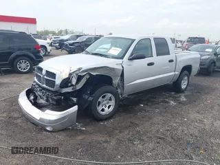 2007 Dodge Dakota SLT with VIN 1D7HE48KX7S122712, listed as a IAAI auction lot 41888864 with 114,384 mi miles and . Bid and sale history available at carsss.com. Image 21.