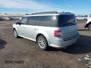 2016 Ford Flex SE z VIN 2FMGK5B8XGBA23900, wystawiony jako IAAI lot #41599714 z przebiegiem 102 961 mil mil oraz . Historia ofert i sprzedaży dostępna na DreamBid. Obrazek 3.