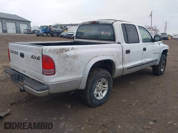2002 Dodge Dakota SLT z VIN 1B7HG48N72S577296, wystawiony jako IAAI lot #41848637 z przebiegiem 133 777 mil mil oraz . Historia ofert i sprzedaży dostępna na DreamBid. Obrazek 4.