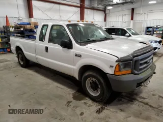 2000 Ford Super Duty F-250 XL with VIN 1FTNX20L7YEB72760, listed as a Copart auction lot 83383404 with 153,249 mi miles and Clean Title. Bid and sale history available at carsss.com. Image 4.
