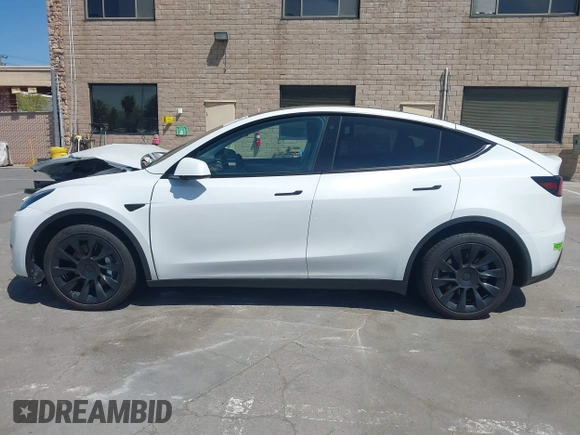 2023 Tesla Model Y Long Range with VIN 7SAYGDEE8PF612438, listed as a IAAI auction lot 41991145 with 29,775 mi miles and . Bid and sale history available at carsss.com. Image 14.