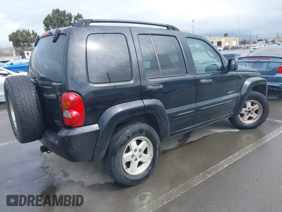 2004 Jeep Liberty Limited with VIN 1J4GL58K14W184032, listed as a IAAI auction lot 41814355 with 276,413 mi miles. Bid and sale history available at carsss.com. Image 4.