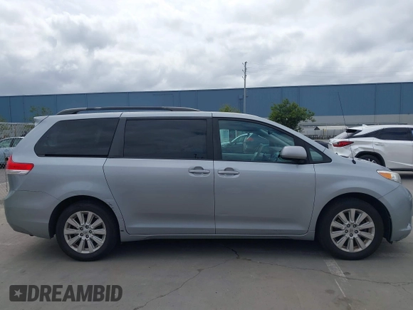 2014 Toyota Sienna LE with VIN 5TDJK3DC1ES080711, listed as a IAAI auction lot 41910679 with 118,788 mi miles and . Bid and sale history available at DreamBid. Image 13.